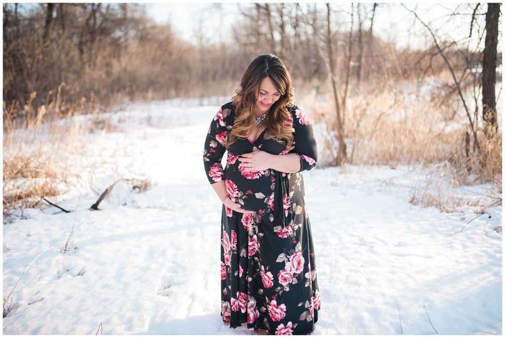Snow maternity session in floral dress by Karen Feder Photography www.karenfederphotography.com