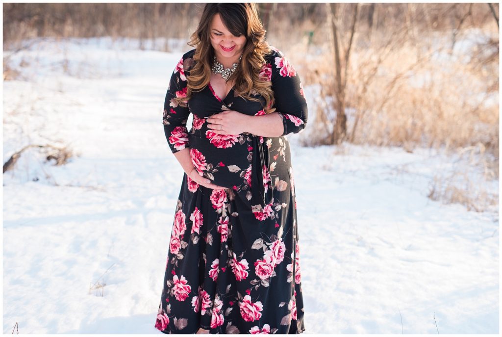 Snow maternity session in floral dress by Karen Feder Photography www.karenfederphotography.com