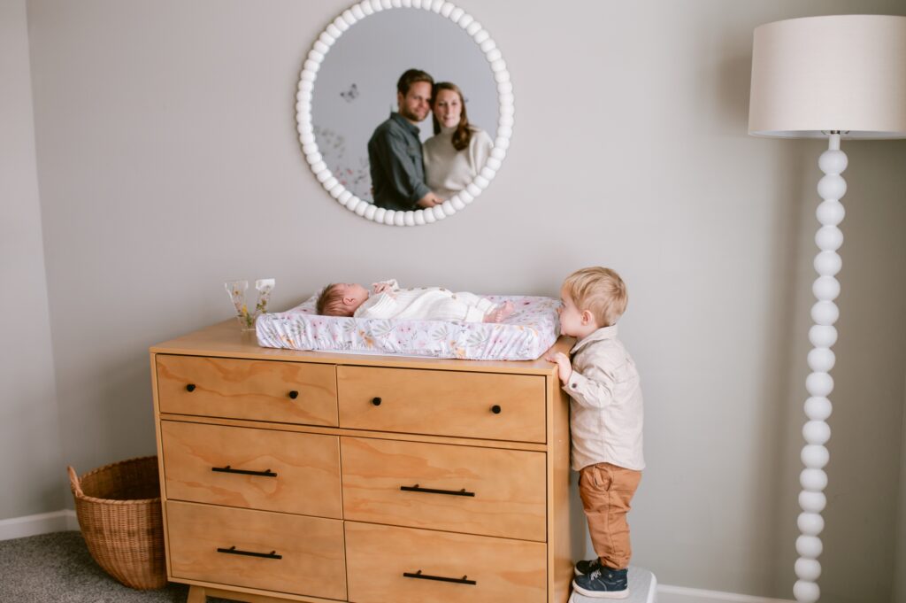 Toddler with newborn in home session eagan, MN